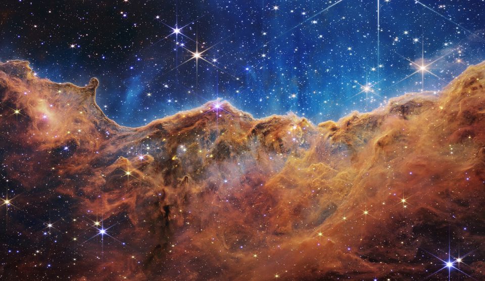 An image of the "Cosmic Cliffs" of the Carina Nebula captured by the James Webb Space Telescope earlier this year. 